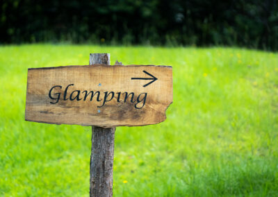 Wooden glamping sign at Kanimbia, Sunshine Coast